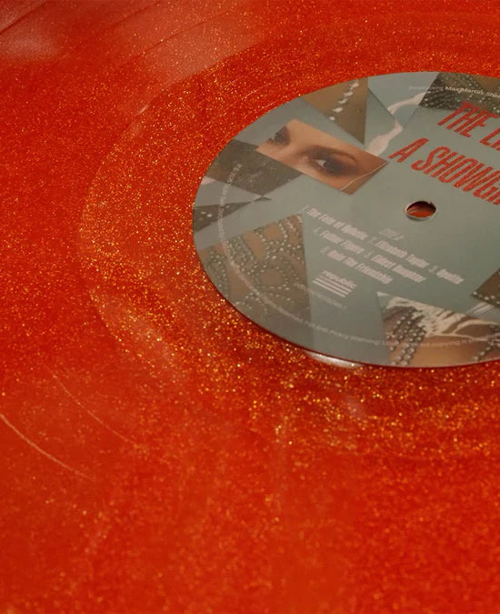 TAYLOR  SWIFT - THE LIFE OF A SHOWGIRLSWEAT AND VANILLA PERFUME PORTOFINO ORANGE GLITTER VINYL